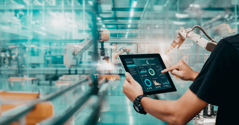 A user working on PLM-ERP integration solution on a production floor